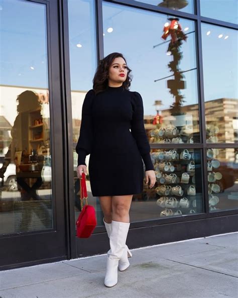 black dress with white boots.